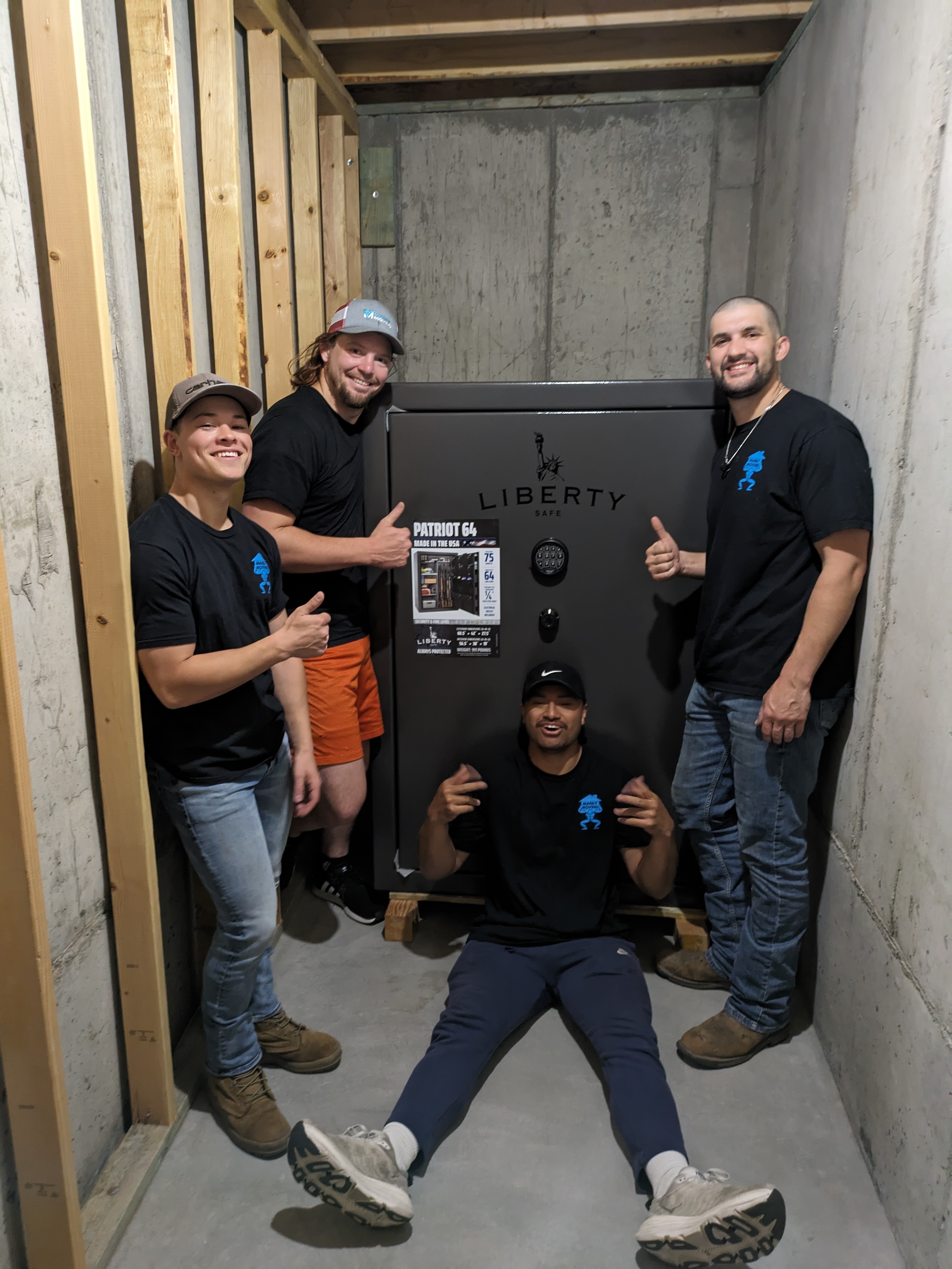 Movers smiling after moving furniture