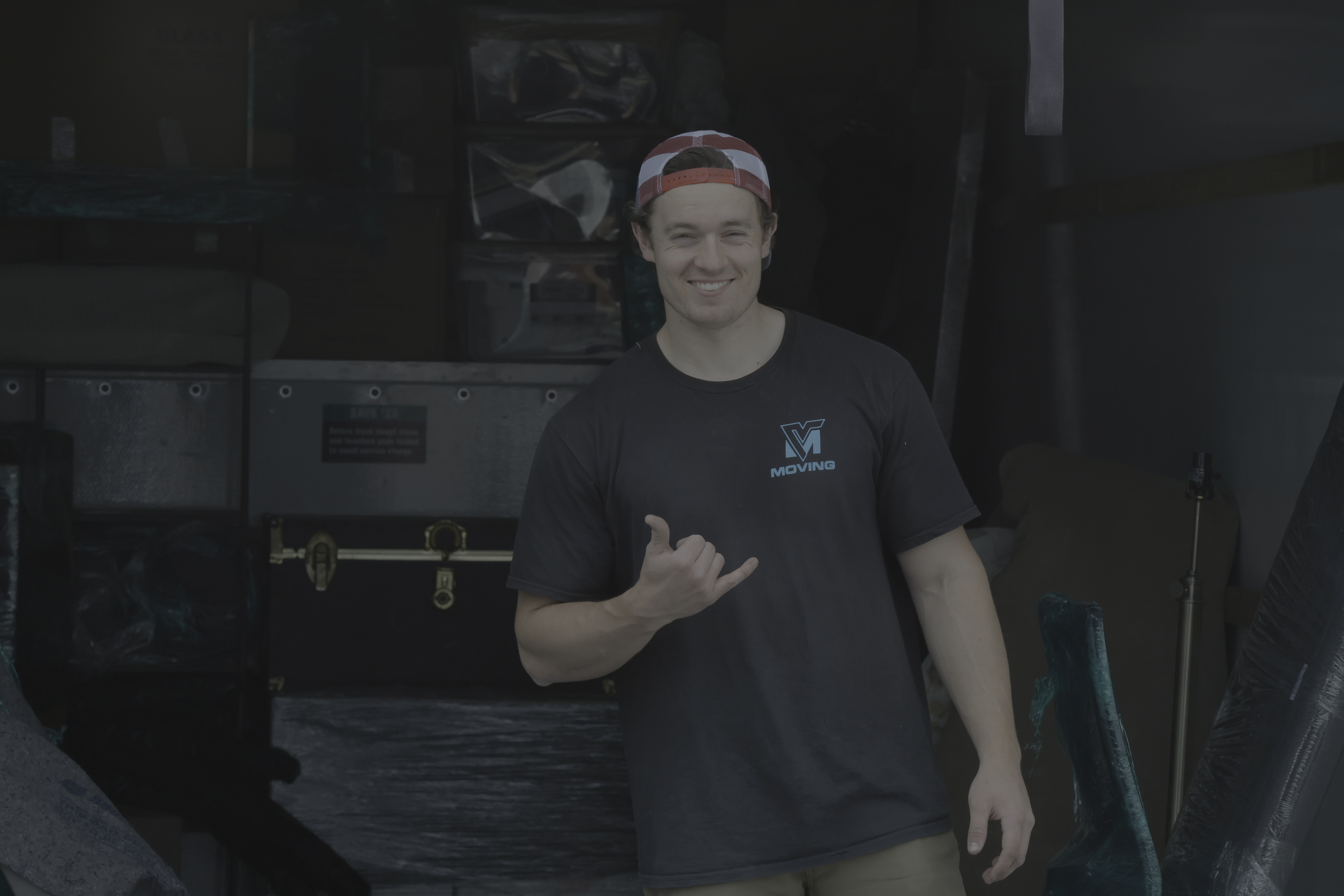 Mover happy to be moving items for a customer.