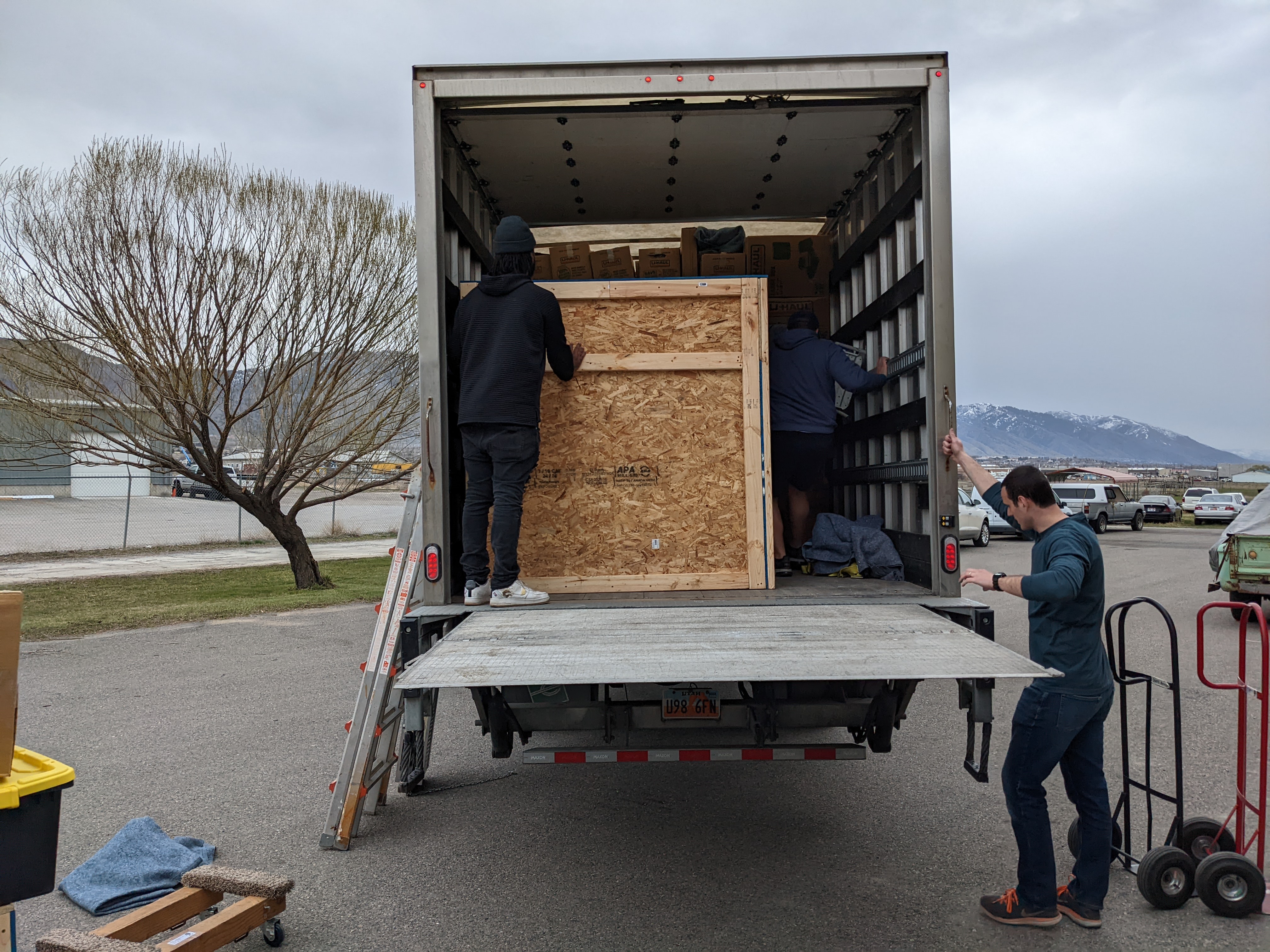 Manly Moving unloading crated commercial items that are very fragile.